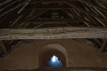 Date and monogram on a beam in the nave March 2014