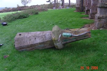 Damaged spire in the churchyard - copyright All Saints Little Staughton