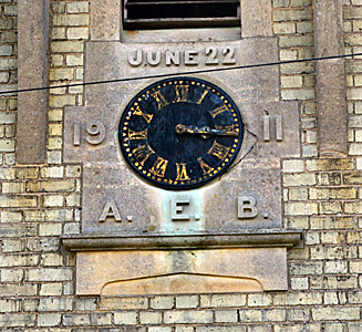 Plaque and clock on the Old School April 2015